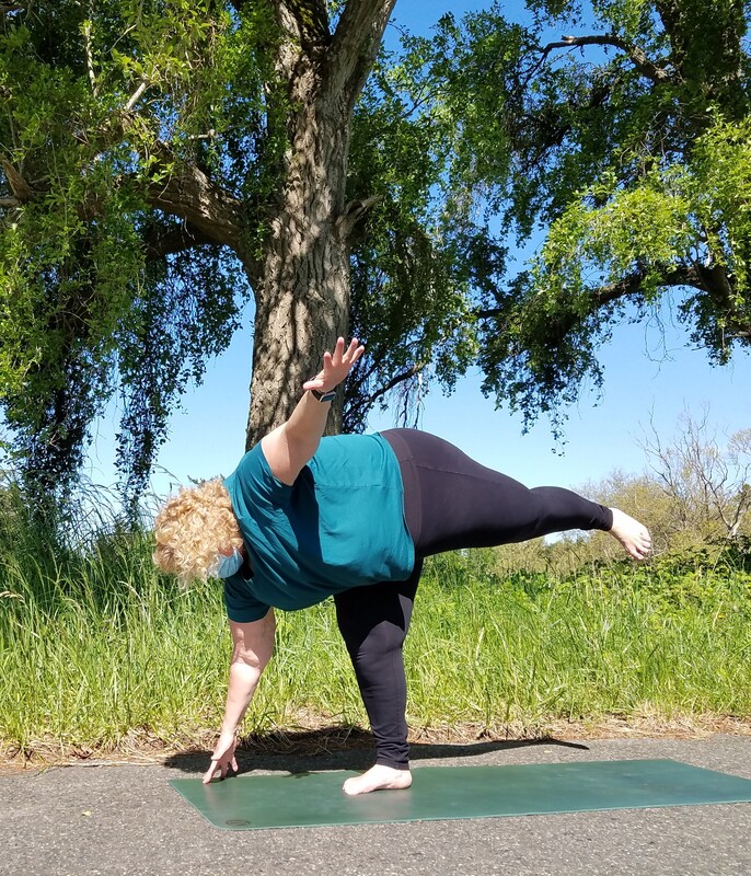 Person stretching in nature